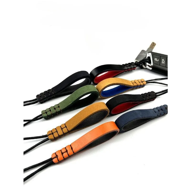 

Wear-resistant Cowhide Personalized Key Chain Laser Custom LOGO Keychain Blank Genuine Leather Handmade Hanging Rope Car Pendant