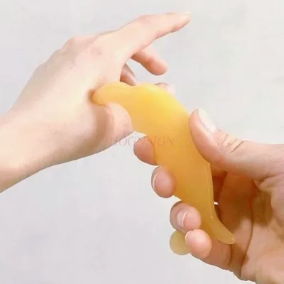 Massage acupuncture stick dolphin type resin whole body acupuncture massager can press the fingers to scrape and use beeswax