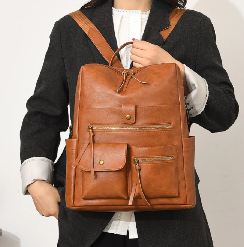 

2026 Korean New Women's Vintage Soft Leather Travel Backpacks High Capacity Casual Shoulder Bags Totes Notebook School Bag