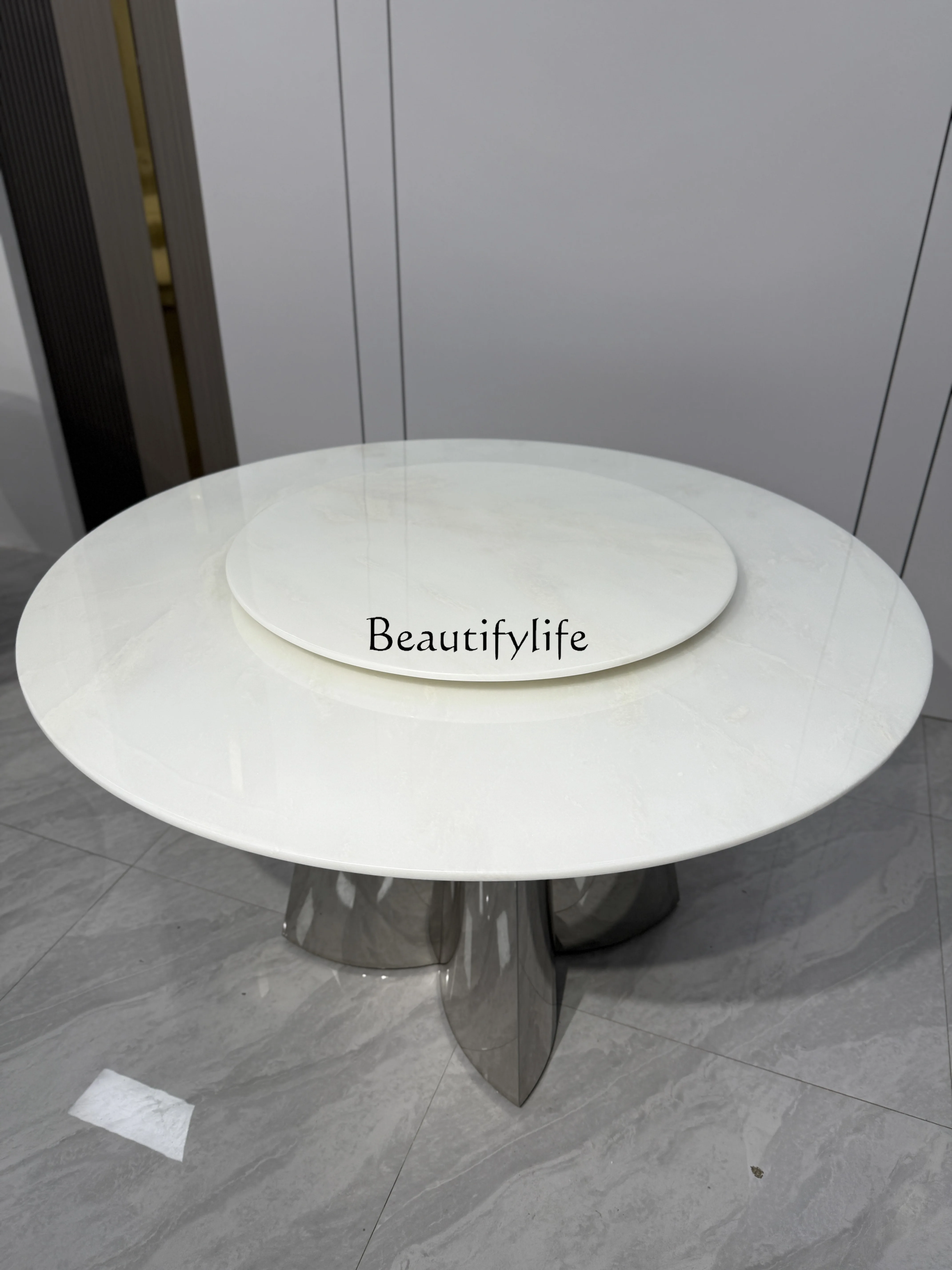 

Luxury stone dining table Light luxury natural marble Kari ice jade round table