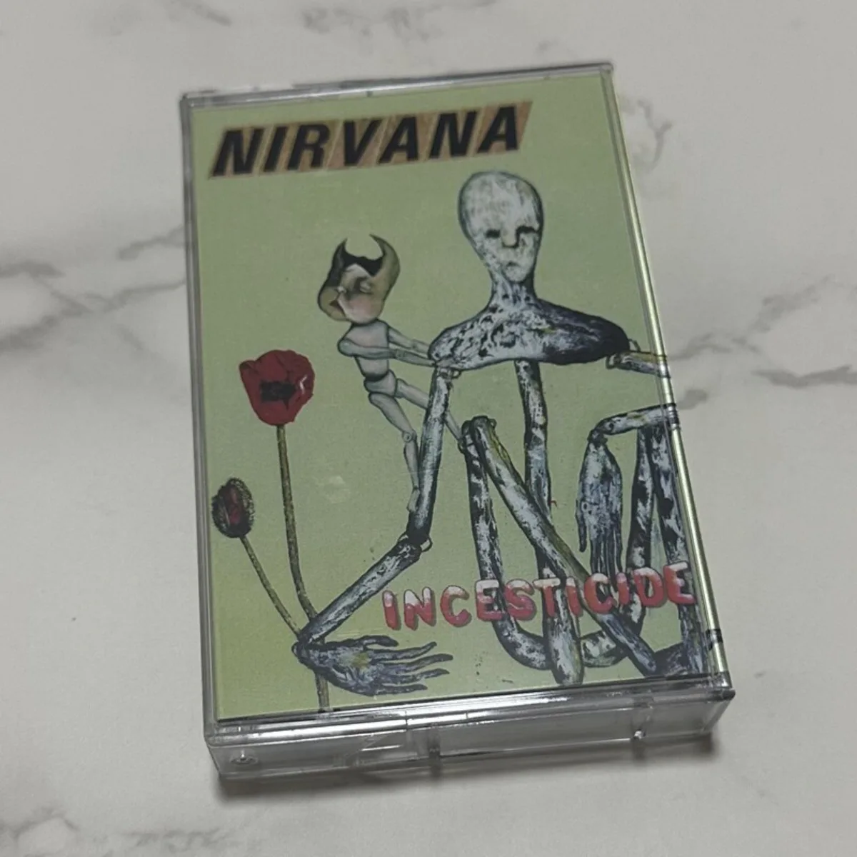 

Nirvana Incesticide Grunge Rock B-Sides Cassette Tape Rare Tracks Collection for Grunge Fans and Music Collectors