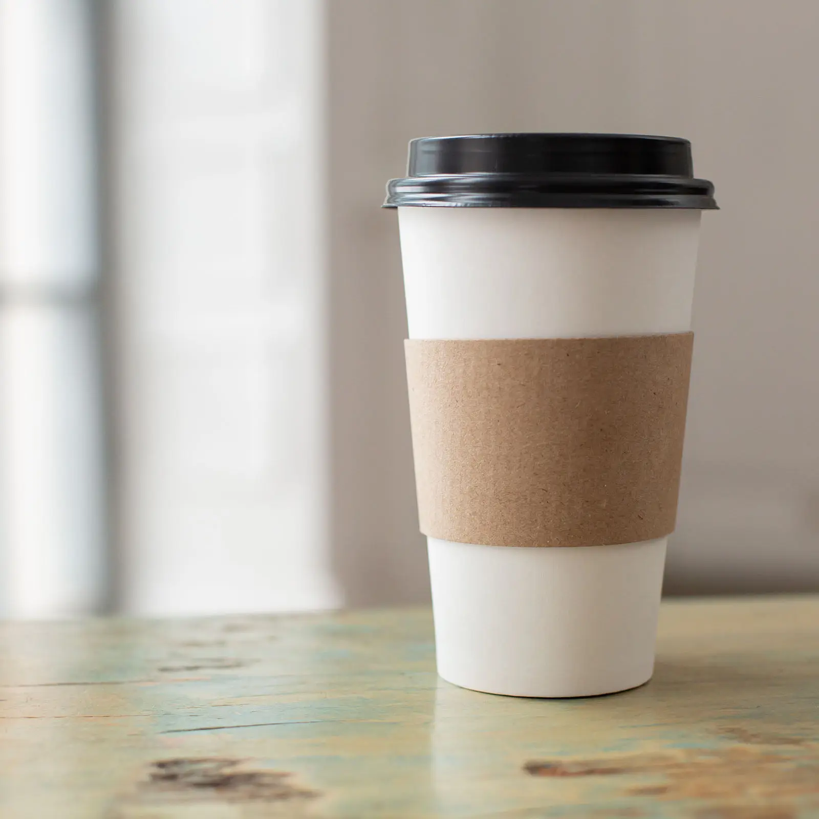 

100Pcs Anti-Scald Cup Sleeve Premium Paper Heat Insulation Protective Cover for Disposable Tea Coffee Cups Lightweight Easy