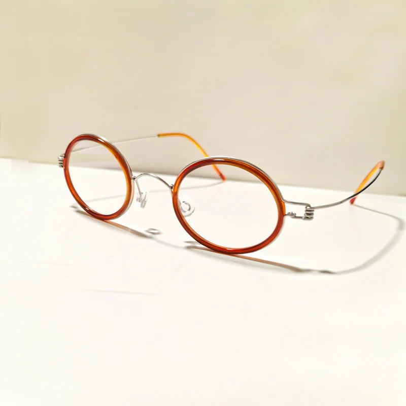 Vintage small elliptical handmade metal and acetate fiber eyeglass frames for men and women's Retro small elliptical spectacle