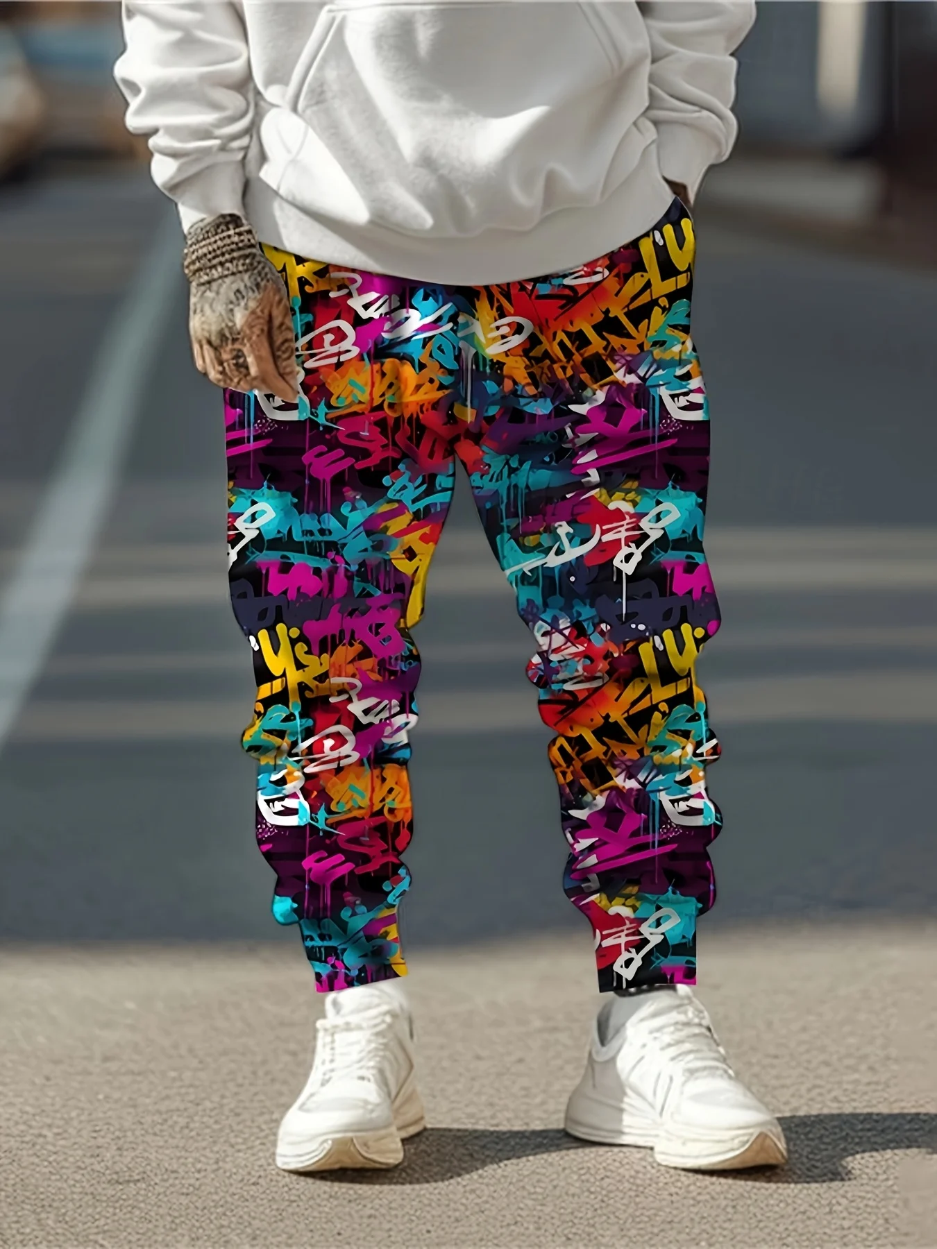 Pantaloni sportivi 2025 da uomo di moda Pantaloni da jogging stampati con graffiti Pantaloni slim fit Pantaloni da salotto casual con tasche Autunno Inverno Streetwear