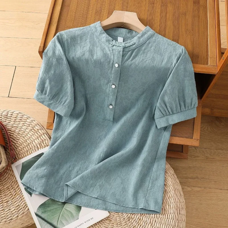 

Women's Light Blue Stand Collar Half-Sleeve Blouse Textured Fabric Button Detail Casual Shirt