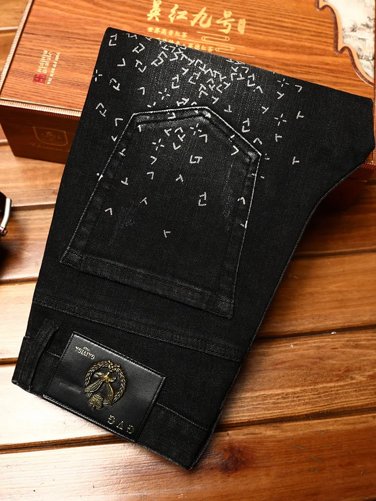 Light luxury fashion black jeans for men's autumn and winter personalized printed elastic slim fit small feet trendy denim pants