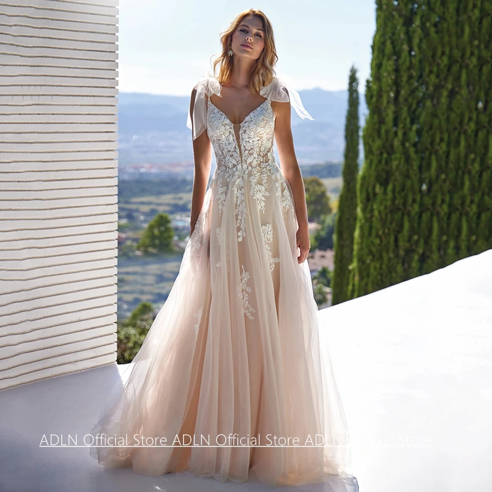 Customized Wedding Dress New Arrival Spaghetti Straps V Neck Sequined Applique Soft Tulle A Line Sweep Train Bride Gown