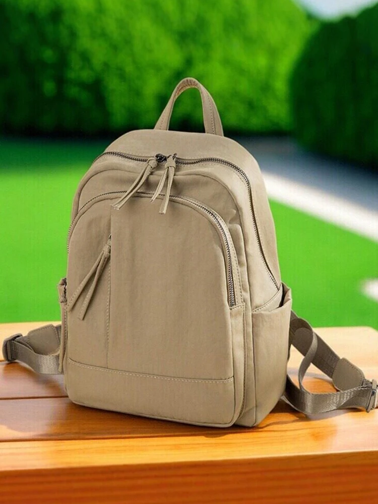 sac-a-dos-decontracte-en-tissu-oxford-pour-femme-nouveau-style-2026-sac-de-voyage-simple-et-leger-petit-sac-a-dos-pour-trajets-quotidiens-et-ecole