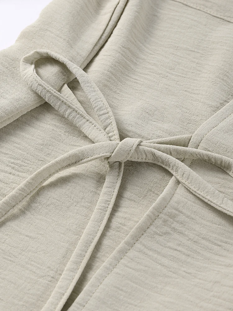 Neue Damen-Outfits: Schicke Anzüge mit Revers, seitlicher Schnürung, langen Ärmeln, Taschen und weiten Hosen – Detail 6