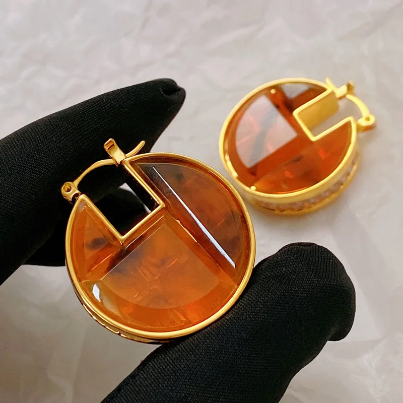 

European and American high-end amber round diamond inlaid niche design earrings