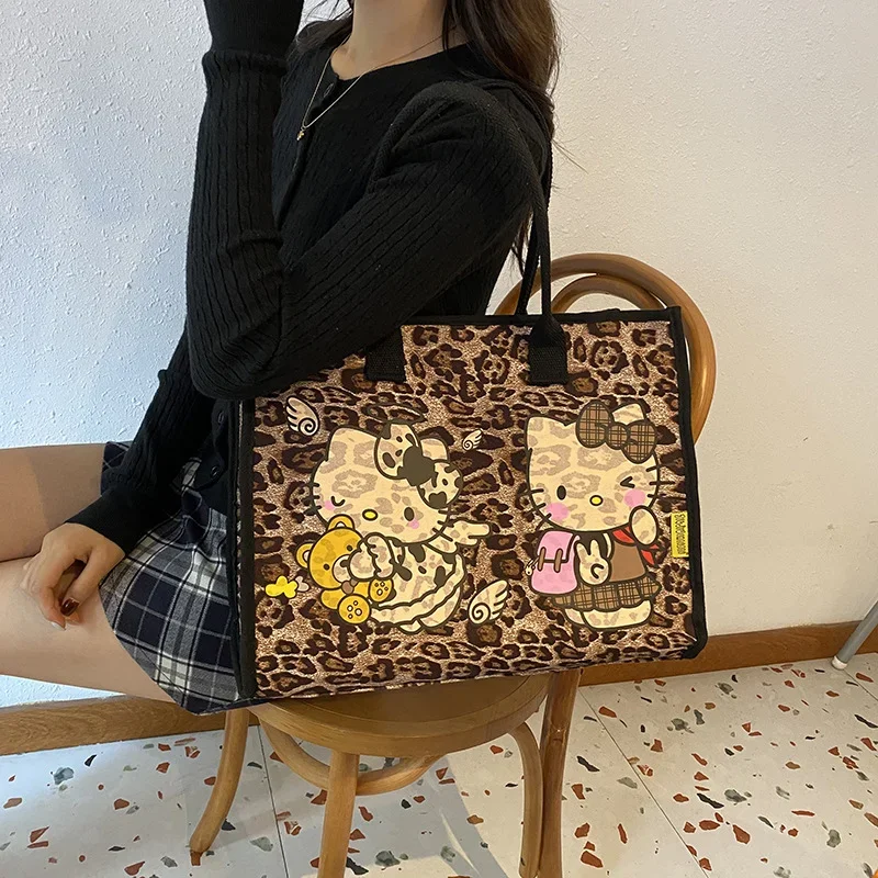 Sanrio Hello Kitty tas kanvas wanita, kapasitas besar Vintage pola macan tutul tas belanja lucu kartun tas Tote tas tangan bahu