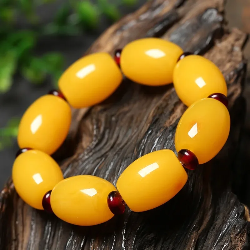 

Natural Baltic Sea Beeswax Bracelet Amber Chicken Butter Yellow Barrel Beads Mens and WoMens Bracelet Beeswax Pendant