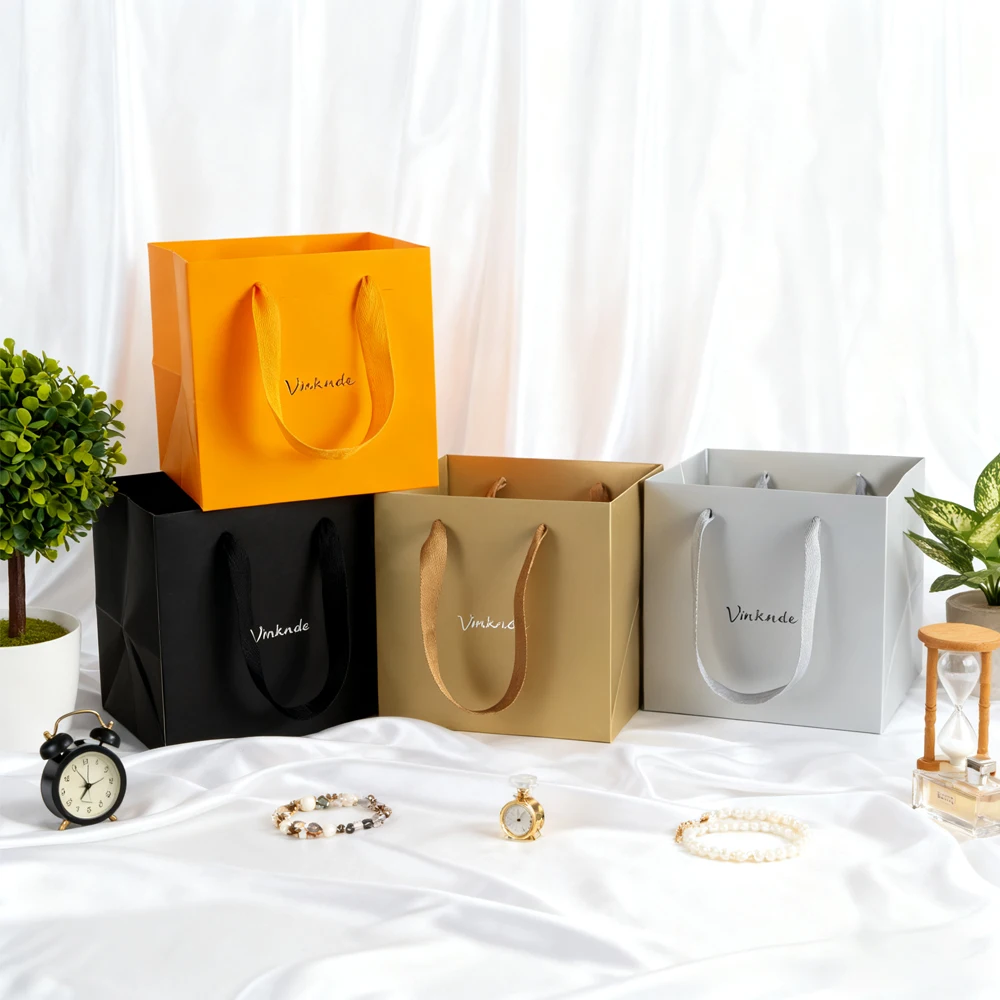 

50pcs Bulk Festive Christmas Gift Bags Personalization Logo Gold Paper Present Sack with Handles for Party Favors Corporate Gift