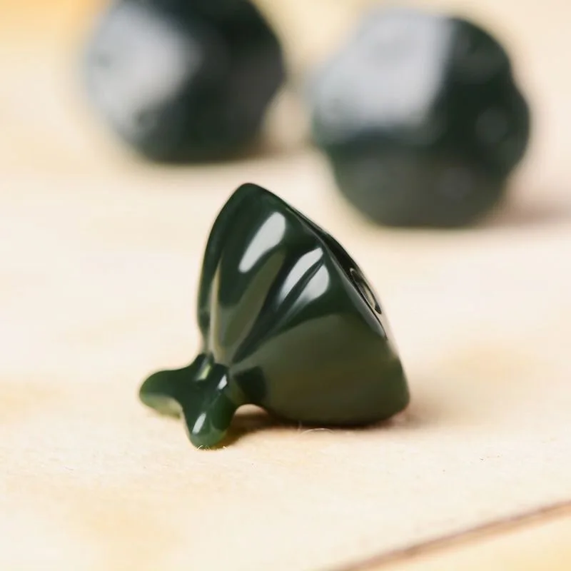 

Xinjiang natural Hetian jade sapphire lotus pod exquisite men's and women's jade pendant