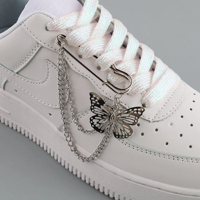 Nike shoes with chains deals
