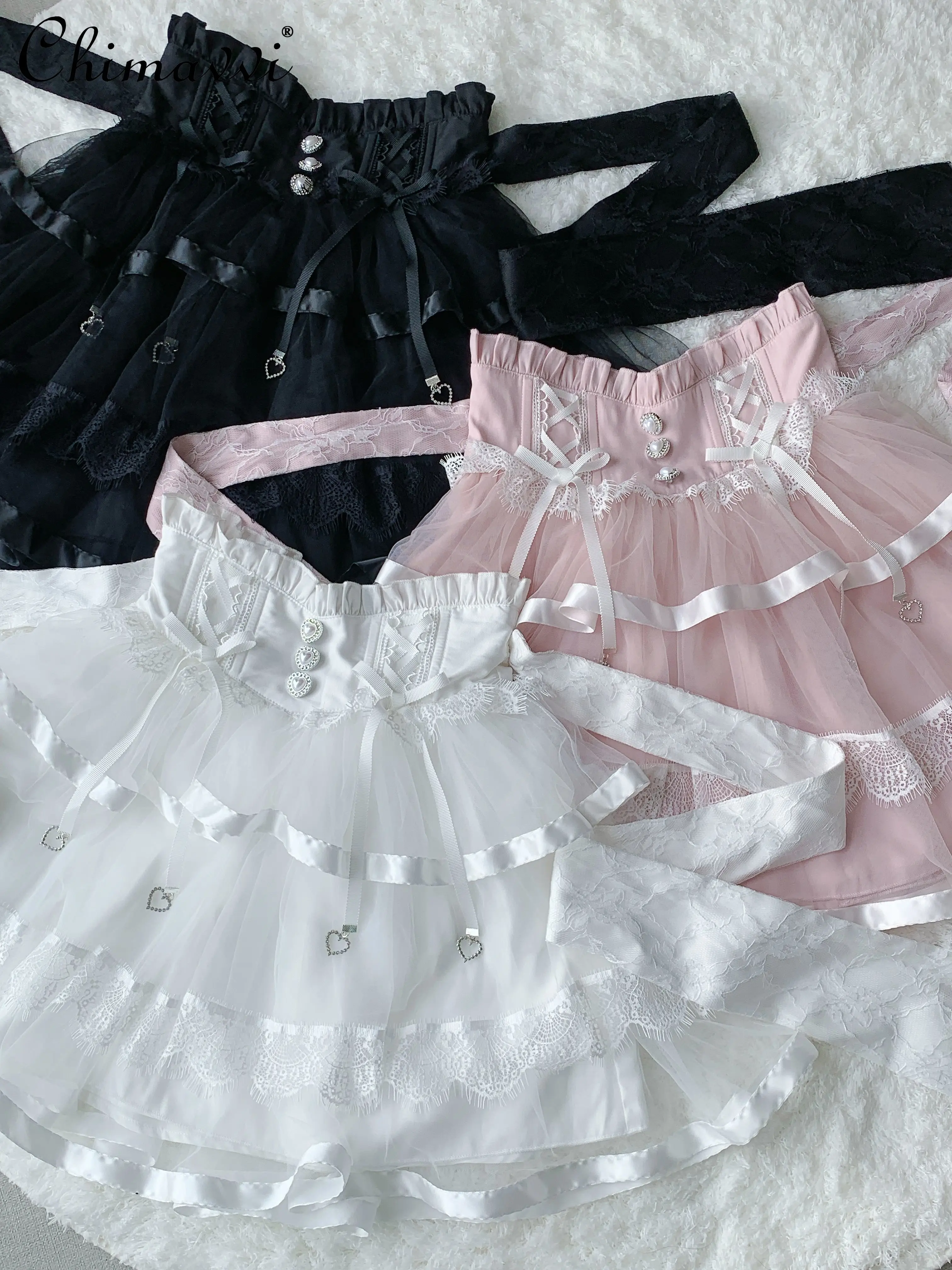 Falda corta Original japonesa para niña, ropa de verano con lazo, malla de encaje, Lolita, faldas cortas de espina de pescado