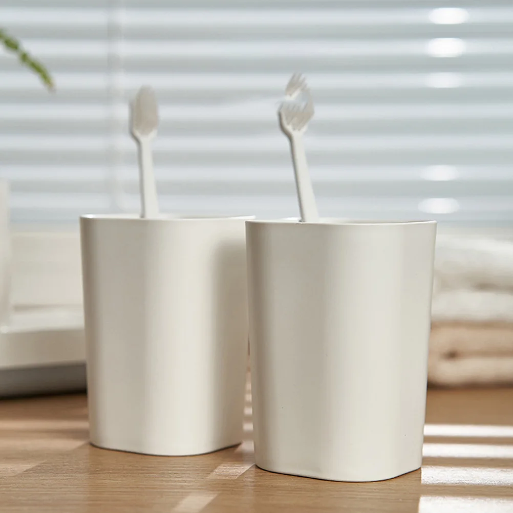 

1pc Toothbrush Holder Abs Material Non-Slip Quick Drainage Cup Stand For Home Bathroom Toiletry Storage Rack White