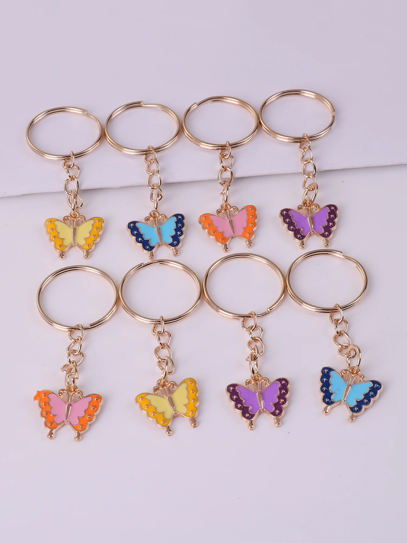 Porte-clés en métal papillon en alliage mignon, porte-clés étoile, décoration de portefeuille, sac à dos, pendentif breloques, cadeau de fête d'anniversaire, 8 pièces