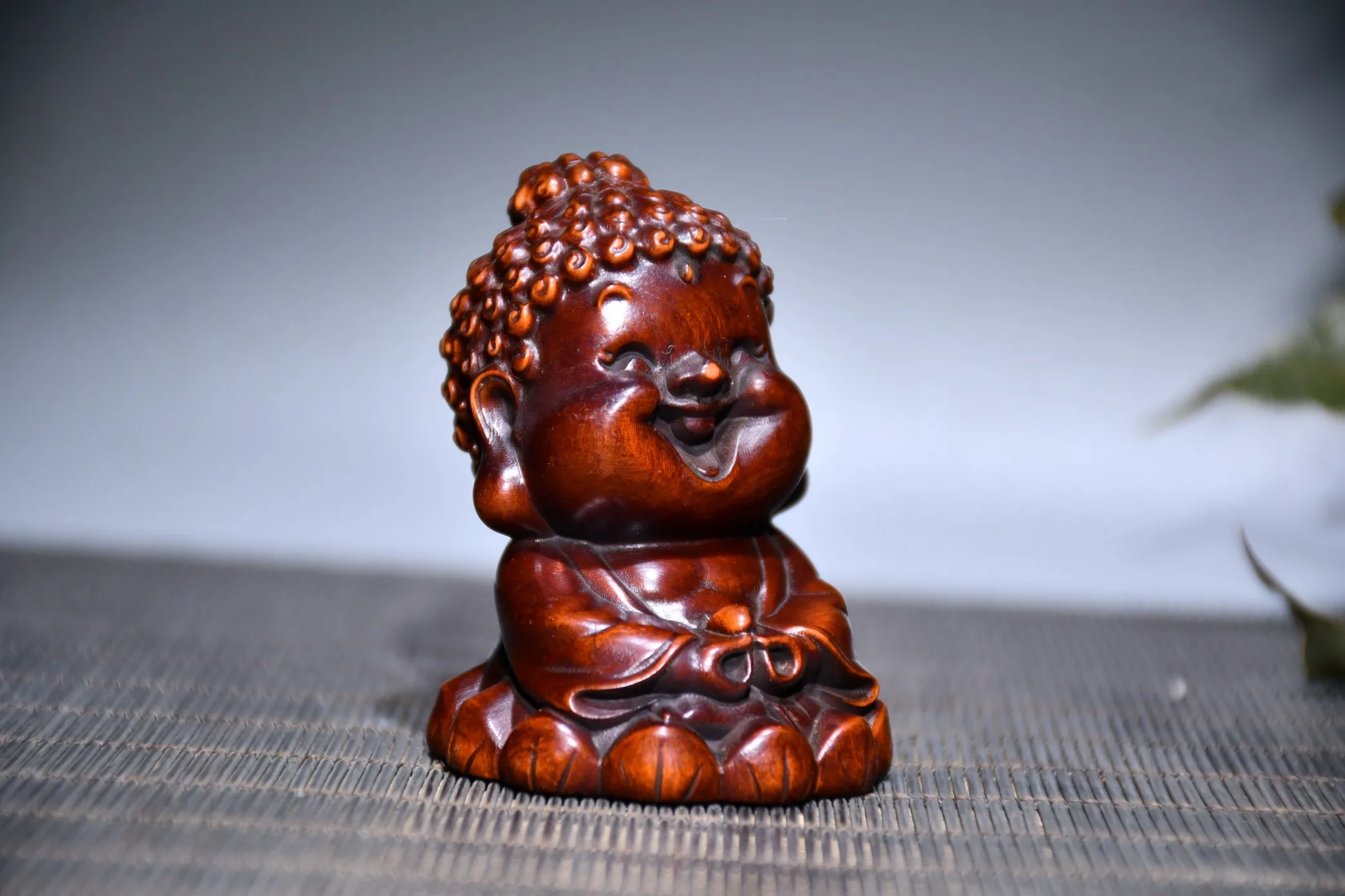 Chinese Style Cartoon Laughing Buddha Statue Wood Carving Cute Baby Buddha Sculpture Sakyamuni Decorative Statue view 6