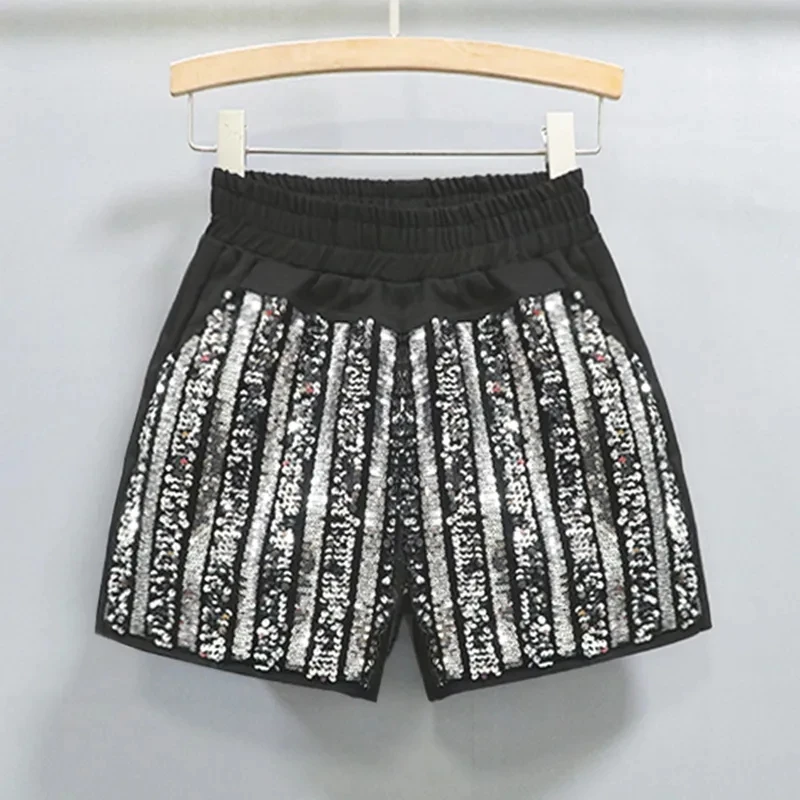 2025 Primavera/Estate Nuovi pantaloncini elastici in vita moda scintillante Discoteca socialite Pantaloni caldi in tre parti Tendenza donna