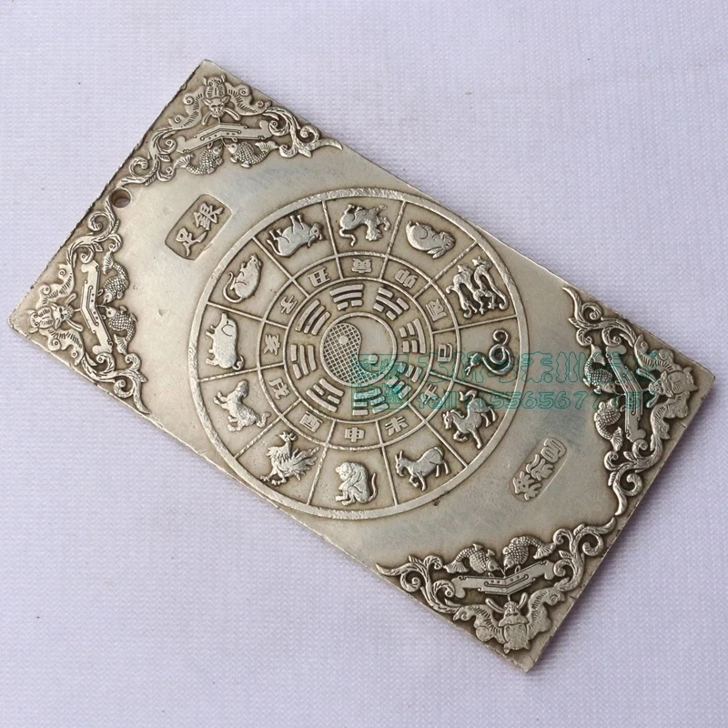 

Chinese tibet Silver Bullion thanka Fengshui Ssangyong's celebration longevity statue amulet Waist tag, hang metal handicraft