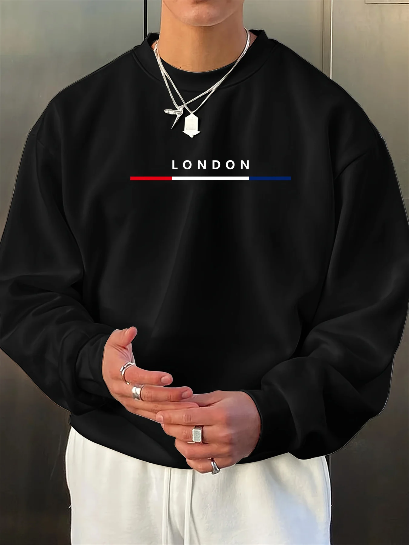 سترة رجالية عصرية للخريف والشتاء فضفاضة بنمط حروف لندن مطبوعة بأكمام طويلة ورقبة دائرية