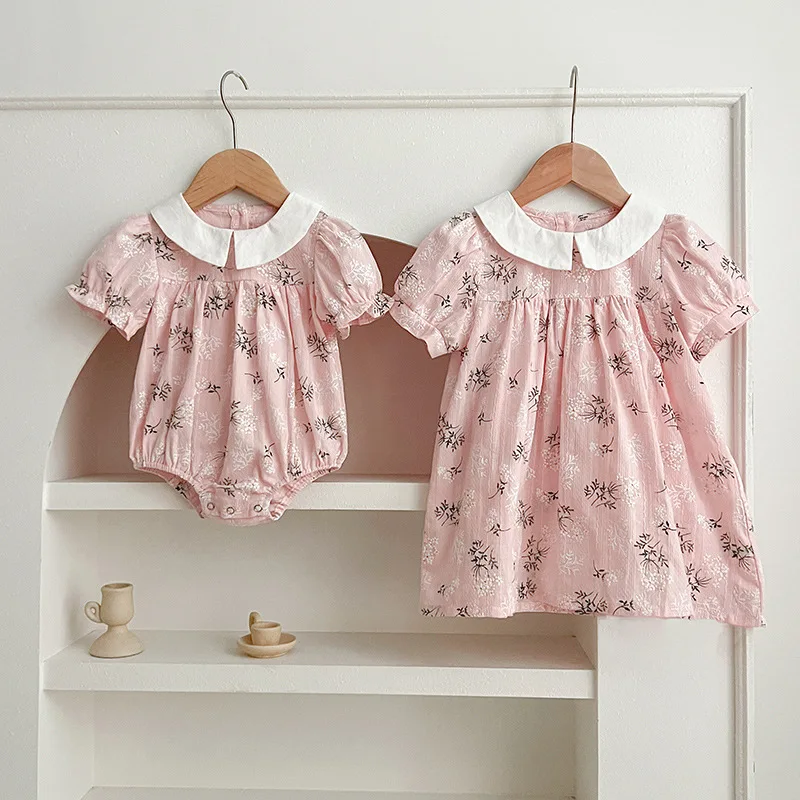 

2024 Summer New Girls' Doll Collar Floral Dress Baby Baby Fart Wrapping Romper Triangle Creeper sisters Dress