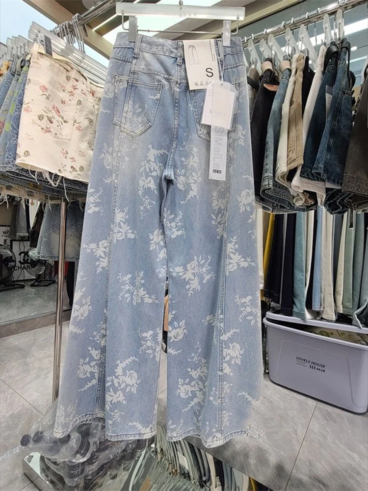 Novedad de verano para mujer, pantalones de suelo a la moda y con estilo, pantalones vaqueros de pierna ancha rasgados con estampado floral retro de estilo americano
