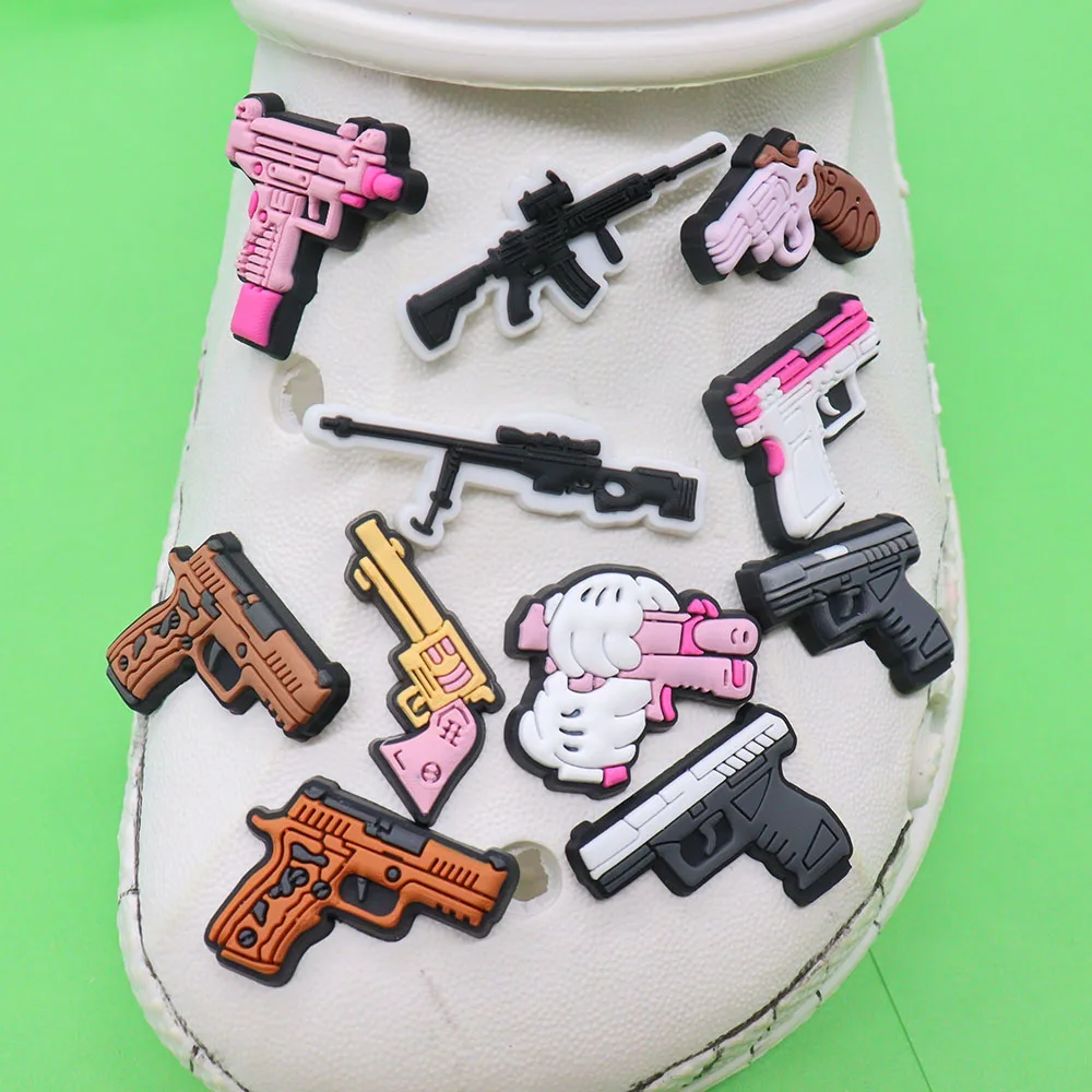 50pcs Wholesale PVC Cool Gun Sandals Buckle Kids Garden Shoes Decorations Fit Adult Bracelet Phone Case Charms