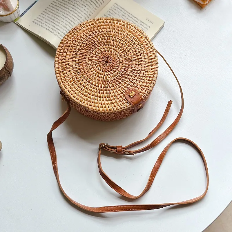 

New women's rattan woven bag, Southeast Asian style diagonal cross mini round retro artistic handmade woven leather buckle bag