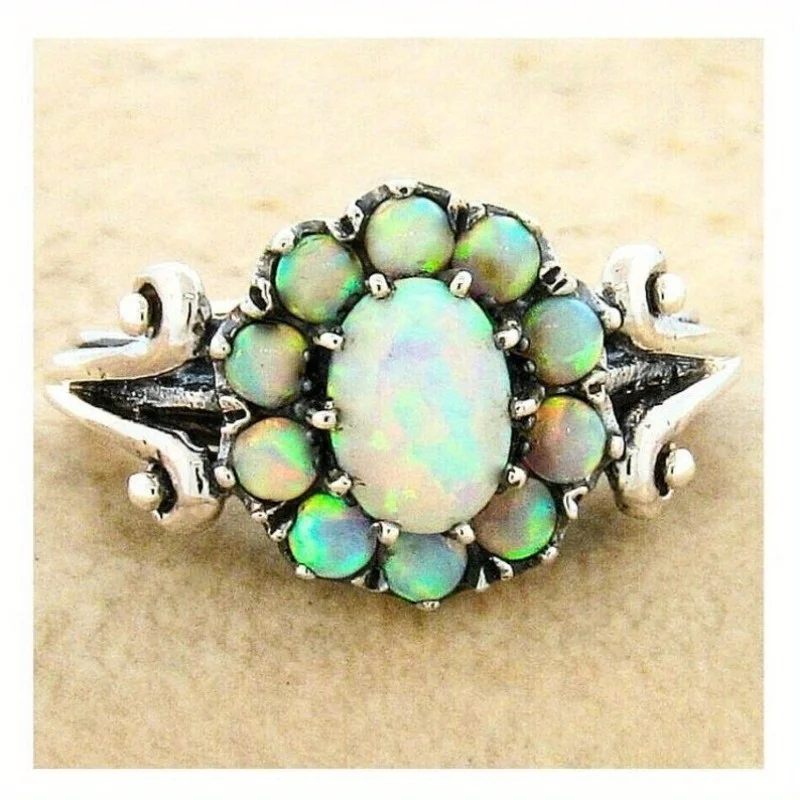 

Винтажное женское кольцо серебристого цвета с имитацией белого опала, украшенное цветочным узором, для повседневной носки и вечеринок