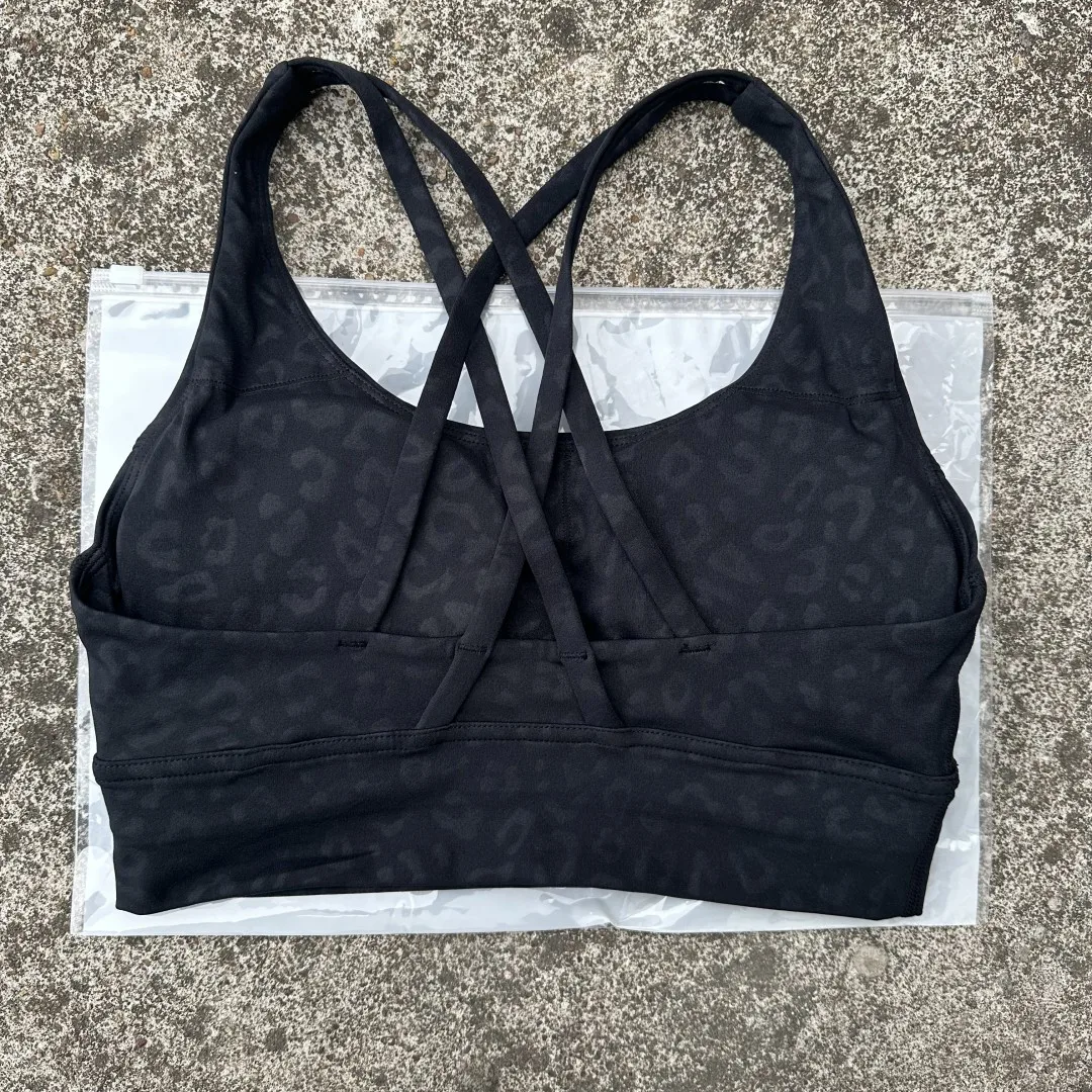 Reggiseno sportivo da donna fitness antiurto ad alta resistenza tinta unita Yoga Canotta incrociata atletica Allenamento completo con imbottitura