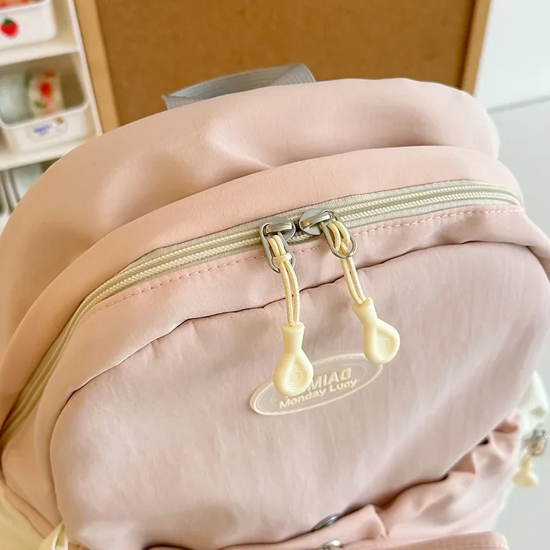 Mochila escolar ligera de gran capacidad para mujer, bolso de hombro impermeable con lazo bonito para estudiante universitario