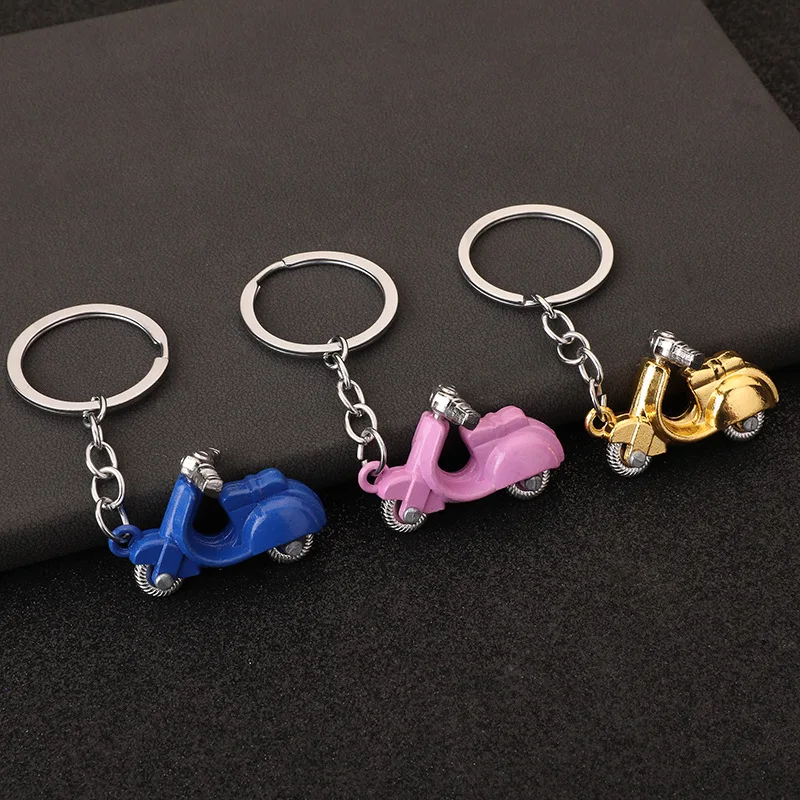 Punk keychain pendant pendant colorful Seiko products figure toy retro motorcycle direction wheels can be turned