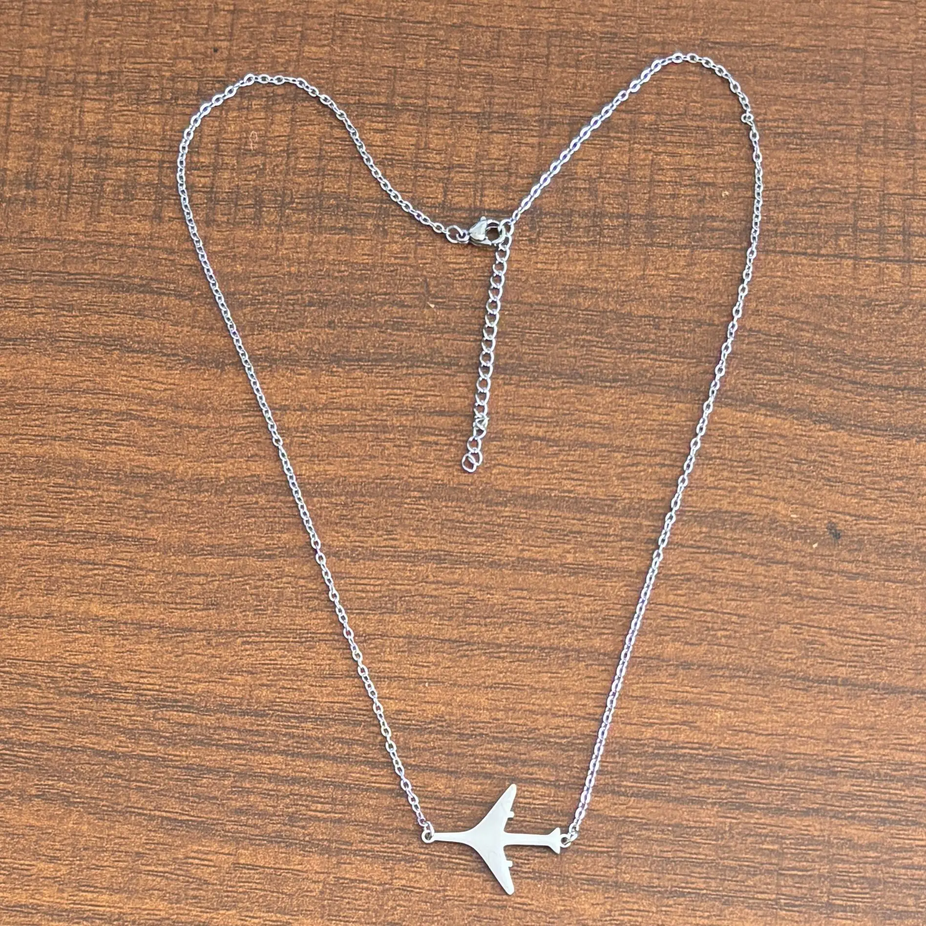 Elegant Stainless Steel Airplane Pendant Necklace - Fade-Resistant, Sleek Hollow Design For Men