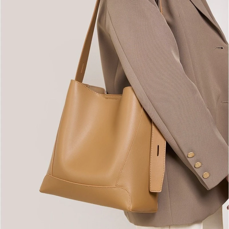 

Solid color bucket bag women's large-capacity commuter tote shoulder messenger bag bucket type