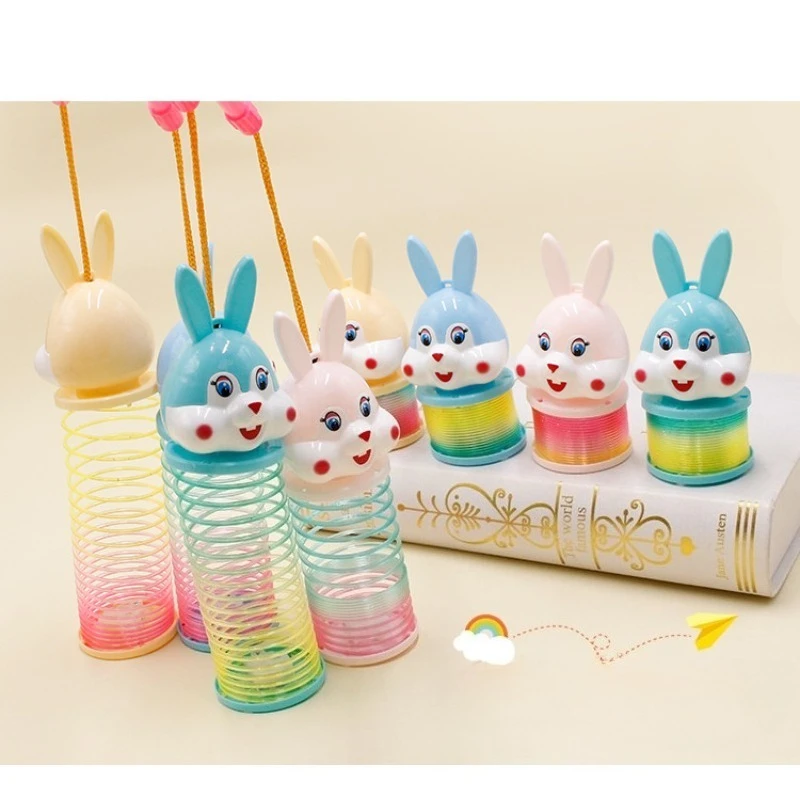 Anello arcobaleno che si illumina al buio con coniglio Lanterna giocattolo Novità Anello arcobaleno con lanterna a forma di cartone animato