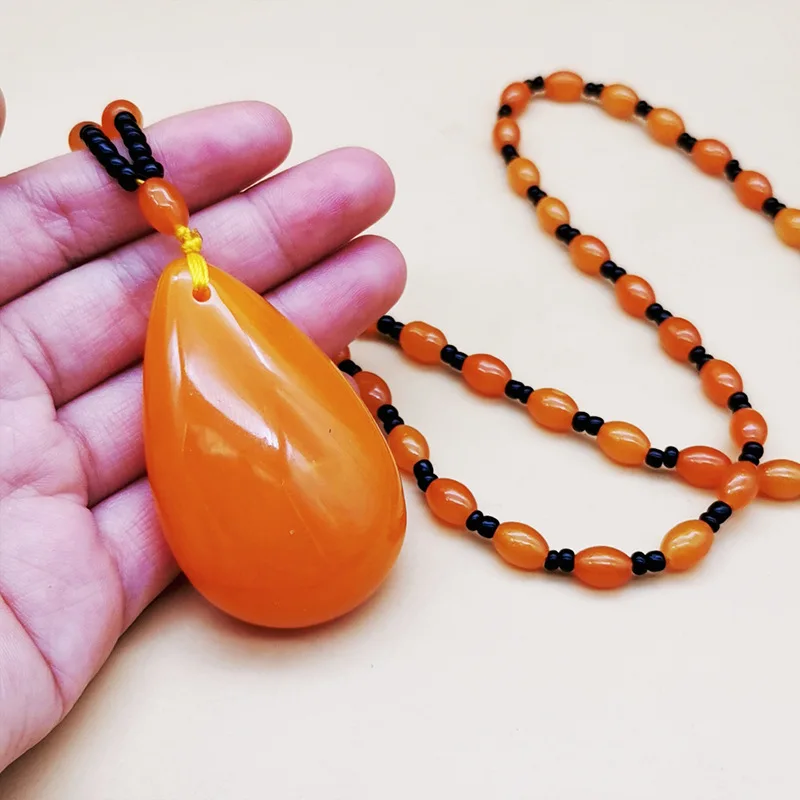 Second-generation orange necklace with water drop pendant, sweater chain, gift, artistic retro chicken oil yellow amber pe