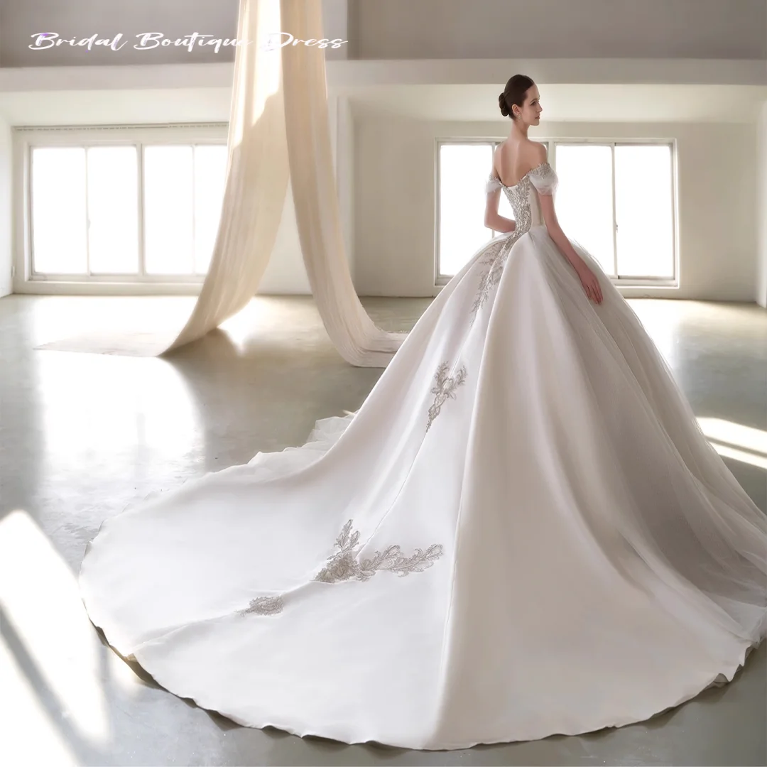 Abito da sposa senza spalline in raso elegante personalizzato senza maniche ricamo di lusso principessa abito da sposa con perline scintillanti abiti