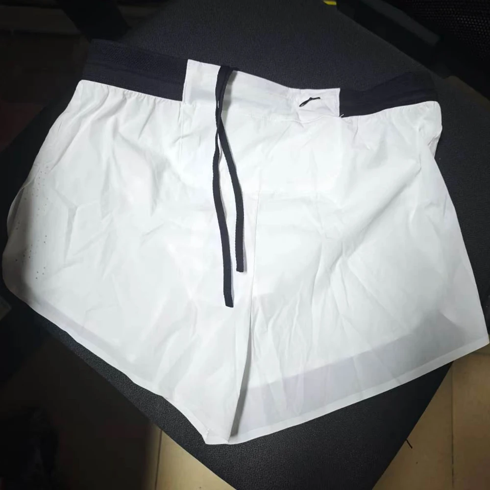 .Manufacturer's supply  running marathon pressure glue shorts Quick-drying breathable loose competitive three-point shortsYS2003