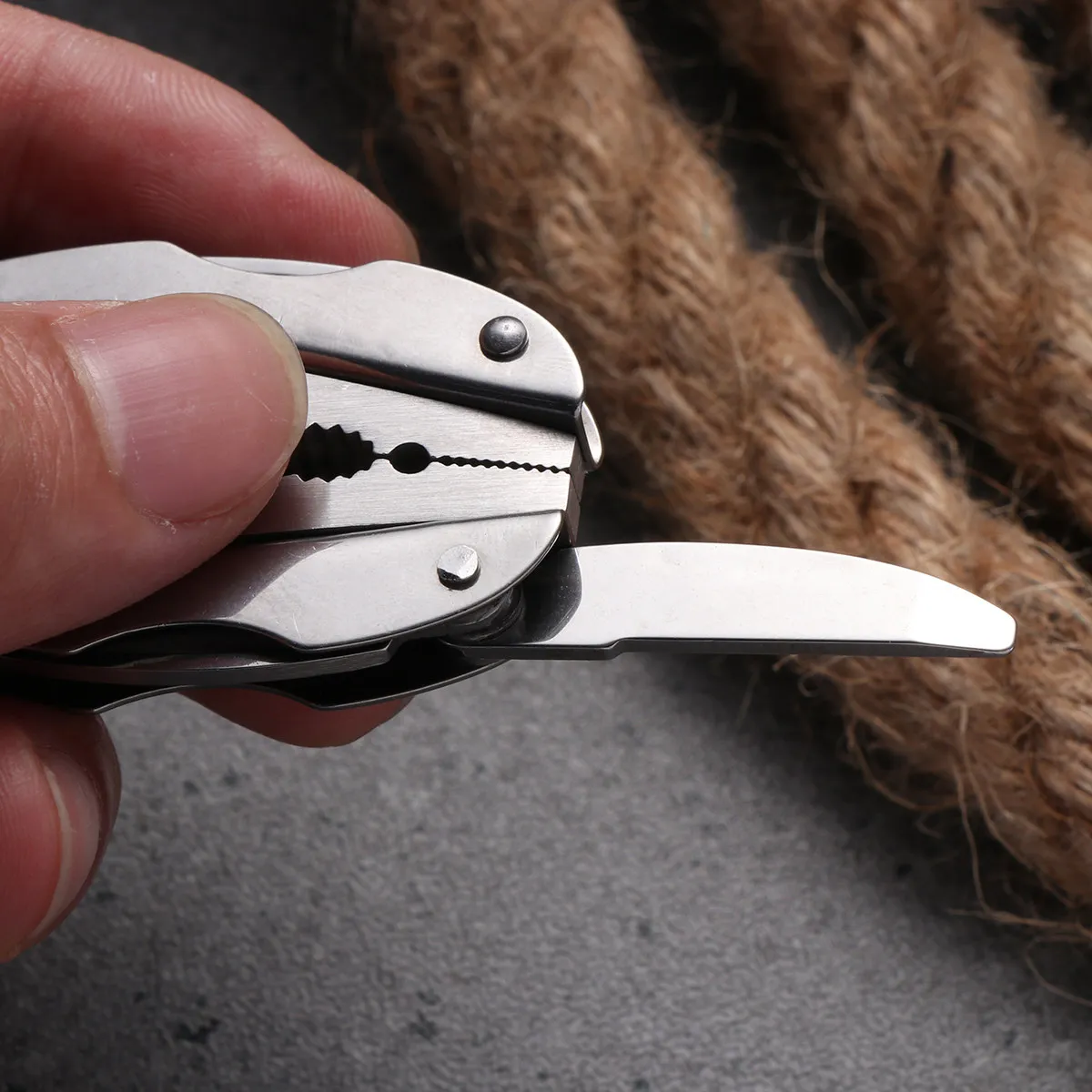 

Portable Multi-Tool Pliers Stainless Steel Mini Folding Plier with Hammer Wrench Saw for Daily and Outdoor Use