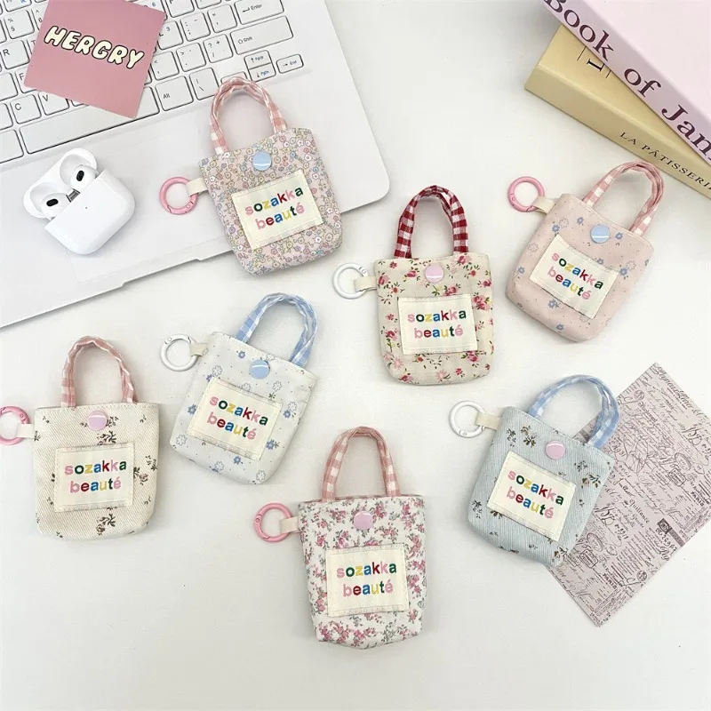 

INS Floral Patchwork Bluetooth Earphone Case Multi-functional Soft Shell Coin Purse Lipstick Compartment Mini Storage Bag