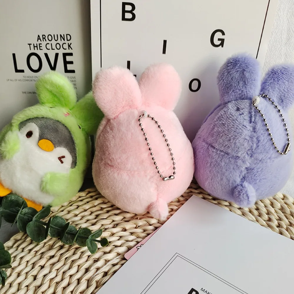 12cm lindo pingüino de peluche de juguete pequeño mochila de dibujos animados muñeca colgante de felpa Kawaii niños regalo pingüino muñeca llavero accesorios de muñeca