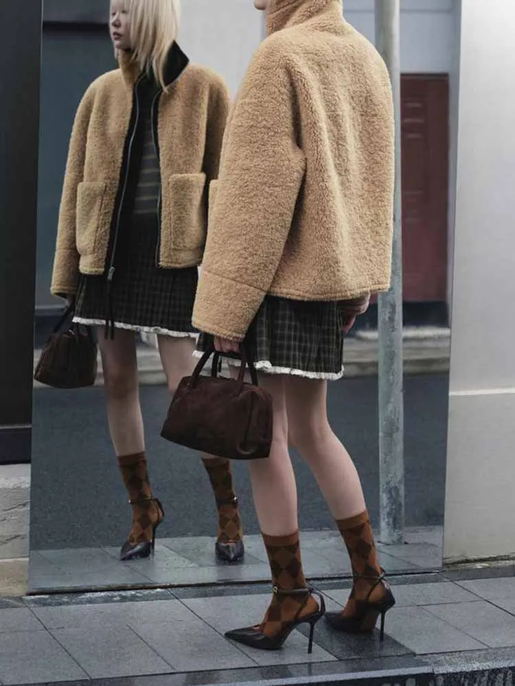 النمط الأوروبي والأمريكي الخريف الوافدين الجدد تصميم الملابس النسائية البسيطة المألوف والعصرية تنورة صغيرة منقوشة الدانتيل #1