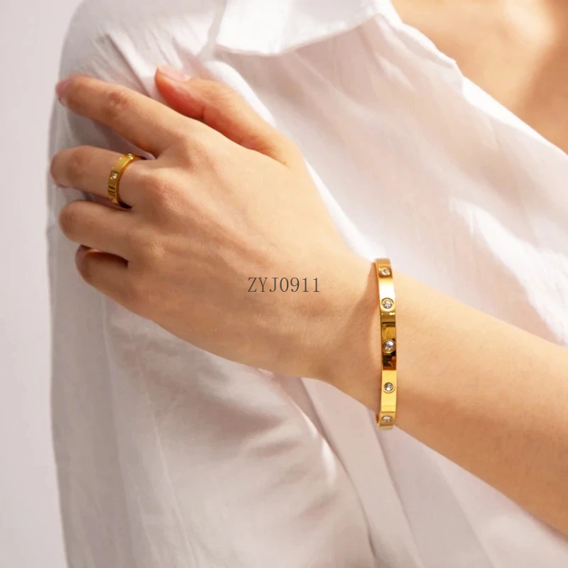 女性用ステンレススチールブレスレット,ゴールドカラーのキュービックジルコニアジュエリー,防水,1セット