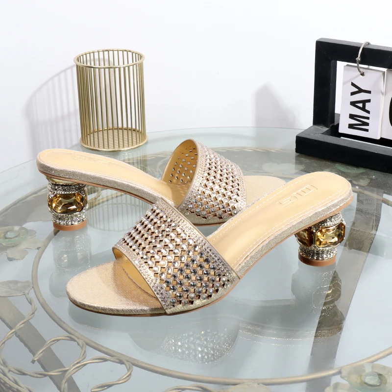 

Golden heeles sandals new rhinestones in the summer 2025 thick heels lady slippers wearing banquet luxury elegant slippers