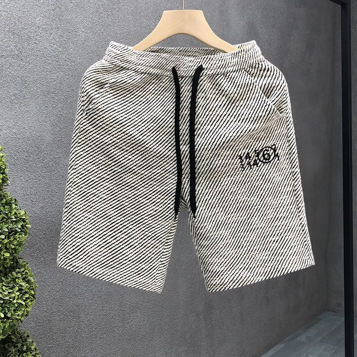 Męskie letnie szorty plażowe Moda Luksusowe szorty codzienne średniej długości