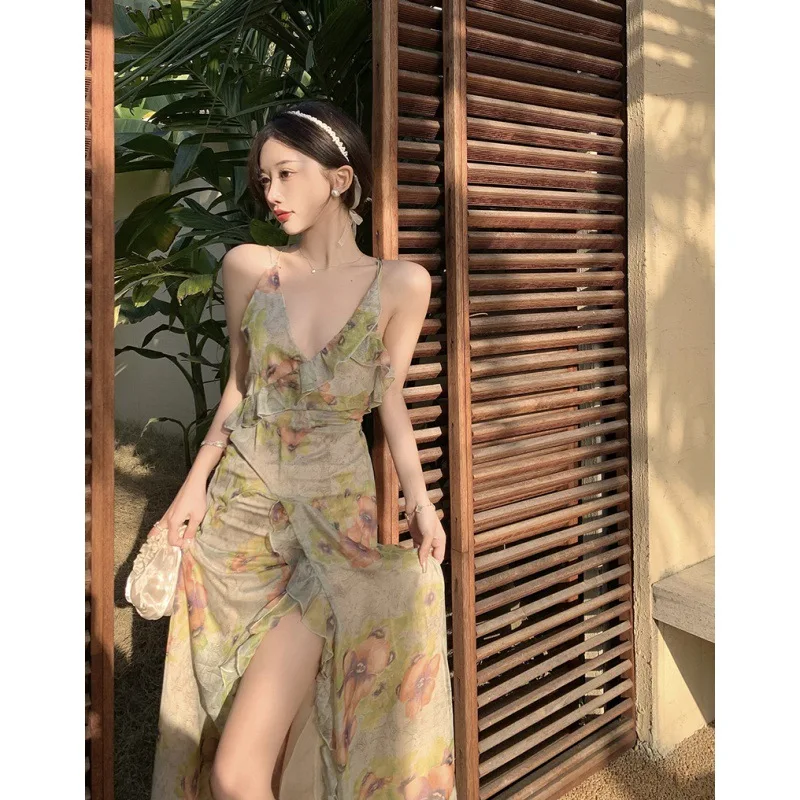 Sanya beach dress women's retro flower oil painting feeling printing suspender V-neck long dress backless dress