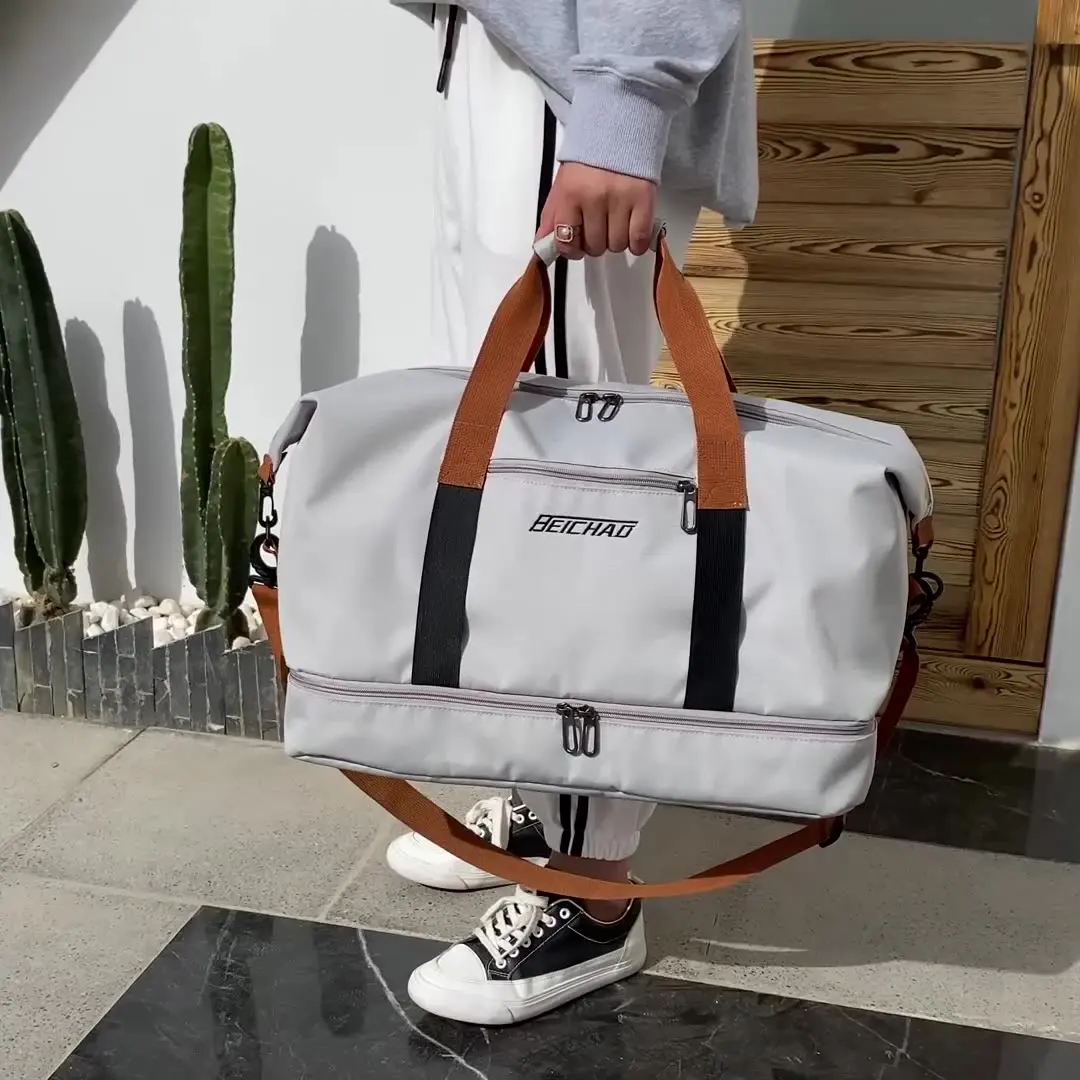 Bolsas de viaje de moda para hombres y mujeres, bolsa deportiva de gran capacidad, impermeable, fin de semana, bolso de mensajero femenino, seco y