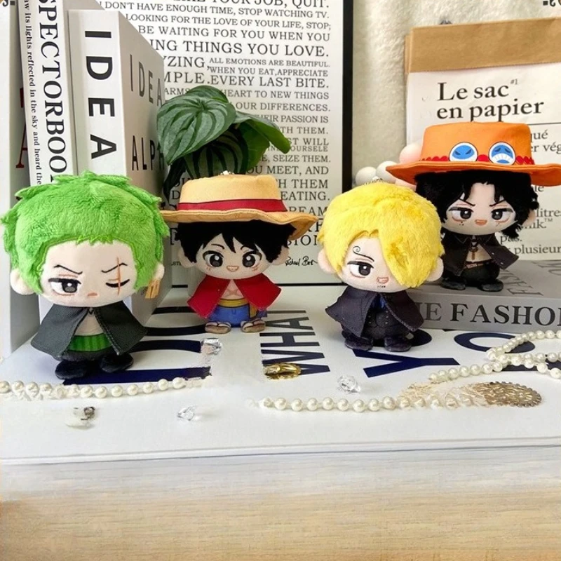 

Подлинная MINISO ONE PIECE Луффи Саурон Шанхис Ace анимация периферийные устройства маленькая сидящая кукла плюшевая кукла брелок